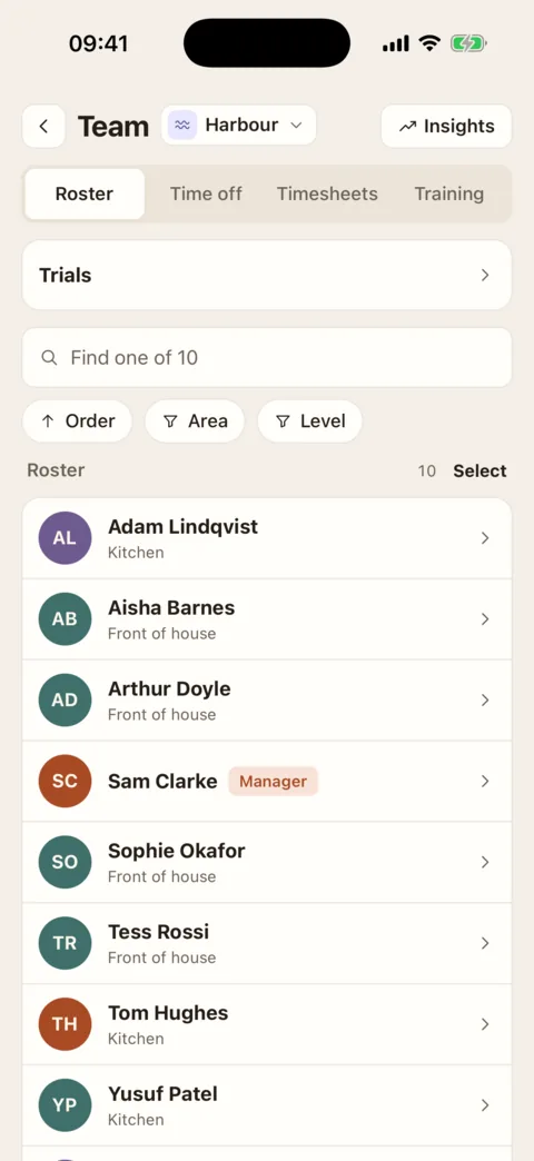The team list: ten people, each with their area, and tabs for time off, timesheets and training.